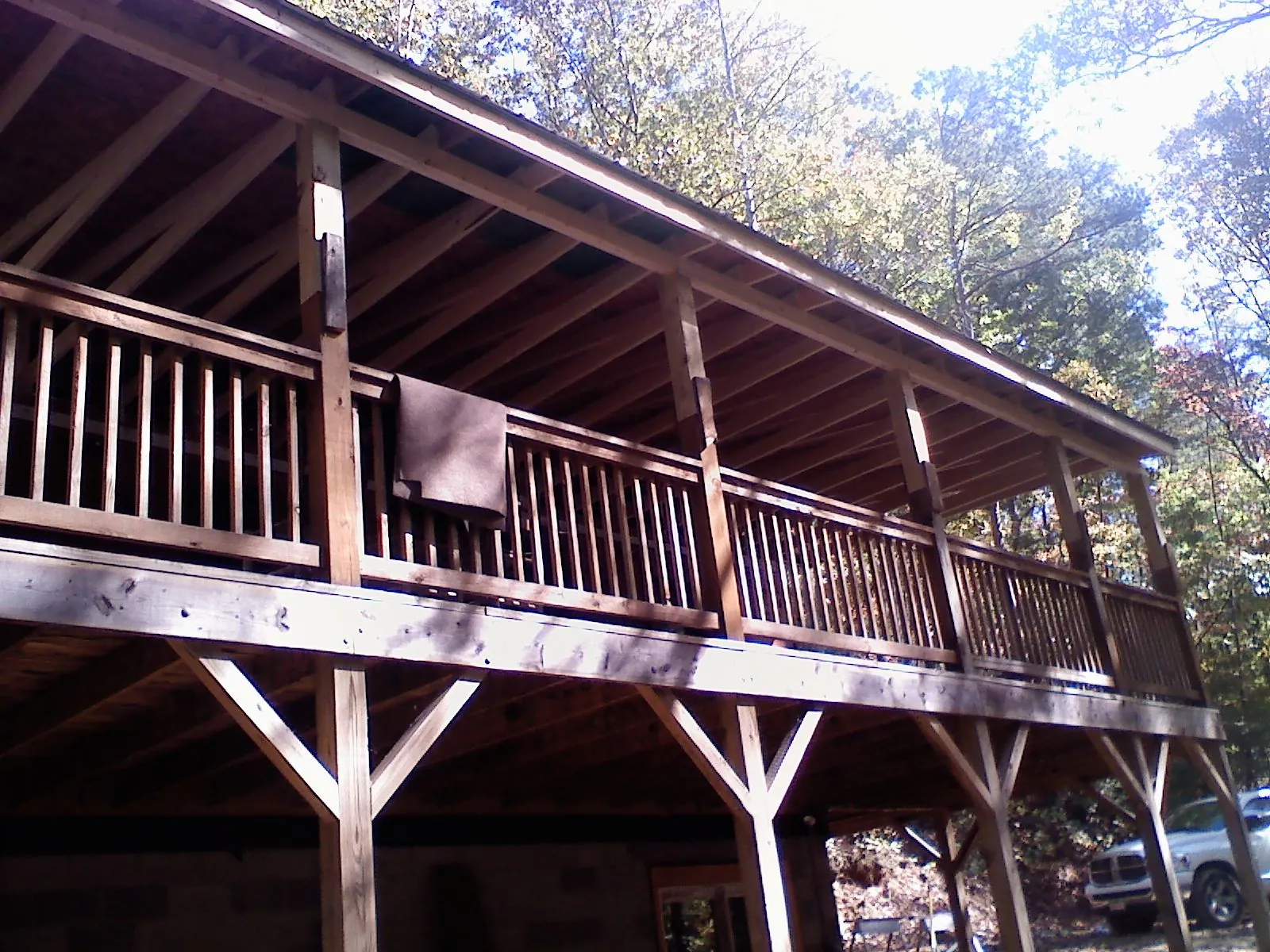 Timber framing under a new elevated porch and deck — Roof Leak Repair in Kenmare by Roofing Brothers